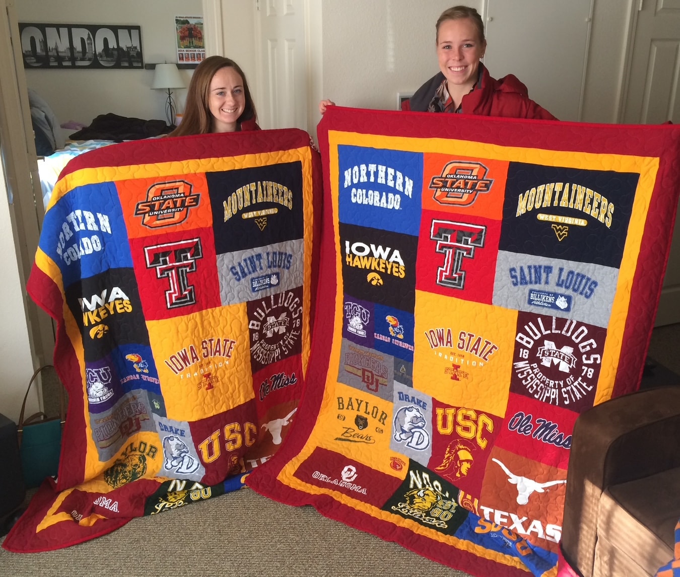 Two girls holding their college t-shirt quilts